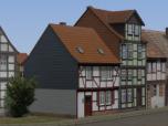 Fachwerkhäuser mit verkleidetem Giebel